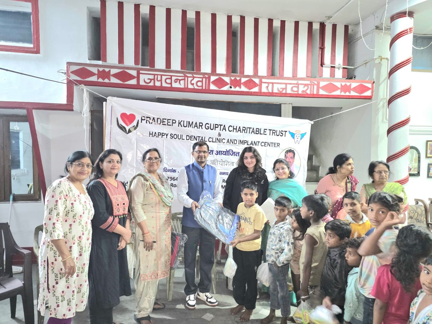 School bag distribution — books, notebooks, and dignity